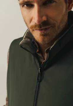 Omkeerbare bodywarmer met hoge kraag Bodywarmers